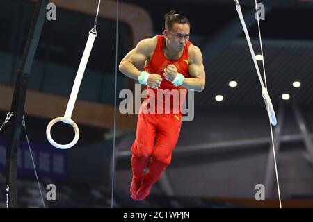 Zhaoqing, China's Guangdong Province. 25th Sep, 2020. Xiao Ruoteng competes during the rings match of the men's individual all-round final at the 2020 Chinese National Artistic Gymnastics Championships in Zhaoqing, south China's Guangdong Province, Sept. 25, 2020. Credit: Xu Ya'nan/Xinhua/Alamy Live News Stock Photo