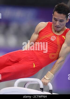 Zhaoqing, China's Guangdong Province. 25th Sep, 2020. Deng Shudi competes during the pommel horse match of the men's individual all-round final at the 2020 Chinese National Artistic Gymnastics Championships in Zhaoqing, south China's Guangdong Province, Sept. 25, 2020. Credit: Xu Ya'nan/Xinhua/Alamy Live News Stock Photo