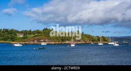 Yachts at anchor in sheltered Badachro Bay near picturesque village of Badachro, Gairloch, Wester Ross, Highland Region, Scotland, UK Stock Photo