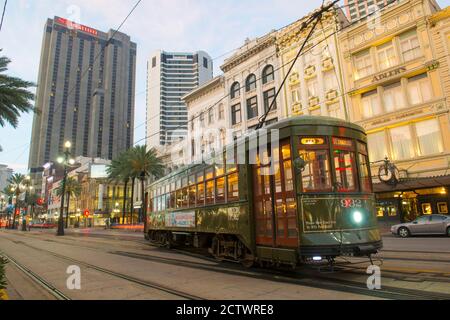 RTA antique Streetcar St. Charles Line Route 12 on Canal Street in morning twilight, New Orleans, Louisiana, USA. This line is registered as a US Nati Stock Photo