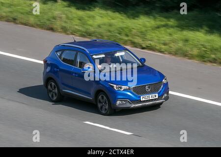 2020 MG Zs Exclusive Blue Car SUV Petrol driving on the M6 motorway near Preston in Lancashire, UK. Stock Photo