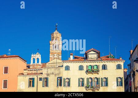 Campo Santo Stefano square with typical italian buildings of Venetian architecture and Santo Stefano Bell Tower in Venice historical city centre San Marco sestiere, Veneto region, Northern Italy Stock Photo