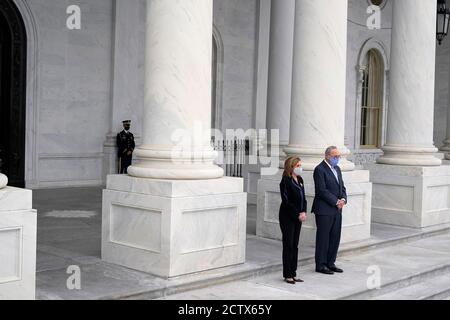 Washington, United States Of America. 25th Sep, 2020. Speaker of the United States House of Representatives Nancy Pelosi (Democrat of California), and United States Senate Minority Leader Chuck Schumer (Democrat of New York) stand at the top of the House steps of the U.S. Capitol as they await the arrival of the casket of Justice Ruth Bader Ginsburg in Washington on Friday, Sept. 25, 2020. Credit: Alex Brandon/Pool via CNP | usage worldwide Credit: dpa/Alamy Live News Stock Photo