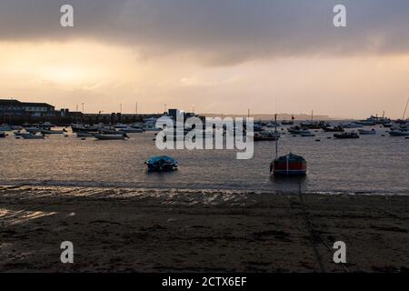 Boats in St Mary's Pool at dusk on the Isles of Scilly, Stock Photo