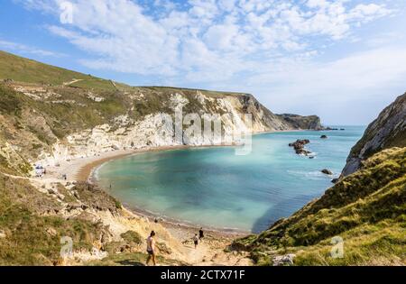 Panoramic coastal clifftop view of Man O'War Bay on the picturesque Jurassic Coast World Heritage site coastline at Durdle Door in Dorset, SW England