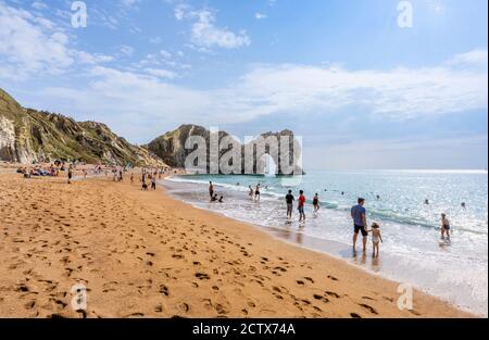 View from the beach of the iconic picturesque Durdle Door rock formation on the Jurassic Coast World Heritage site in Dorset, south-west England Stock Photo