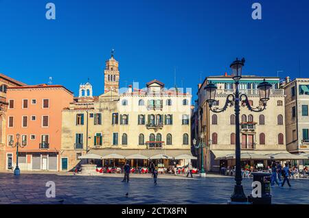 Venice, Italy, September 13, 2019: Campo Santo Stefano square with typical venetian buildings and Santo Stefano Bell Tower in historical city centre San Marco sestiere, Veneto region Stock Photo
