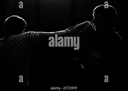 Two amateurs sportmen training boxing Stock Photo