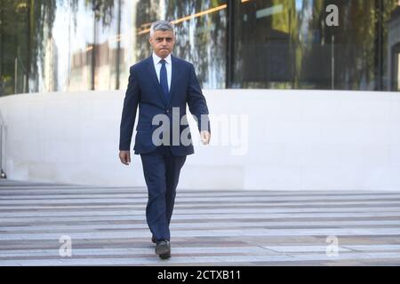 Mayor of London Sadiq Khan arrives to speak to the media at New Scotland Yard, London, following the death of a police officer who was shot by a detainee at Croydon Custody Centre in south London in the early hours of Friday morning. Stock Photo