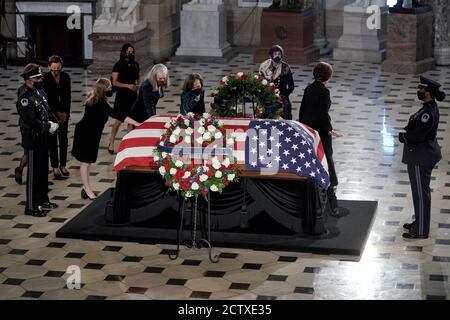 United States Representative Lizzie Fletcher (Democrat of Texas), US Representative Katherine Clark (Democrat of Massachusetts), and US Representative Lisa Blunt Rochester (Democrat of Delaware) pay their respects as the late Justice Ruth Bader Ginsburg lies in state at National Statuary Hall in the U.S. Capitol on Friday, September 25, 2020. Ginsburg died at the age of 87 on Sept. 18th and is the first women to lie in state at the Capitol.Credit: Greg Nash/Pool via CNP | usage worldwide Stock Photo