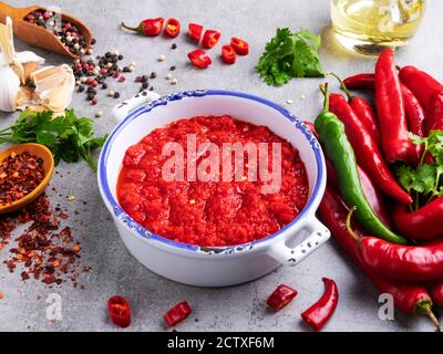 homemade red hot sauce pepper ingredients, spices, close up Stock Photo