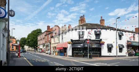 Shops and other businesses on the High Street in the centre of the Yorkshire town of Horbury Stock Photo