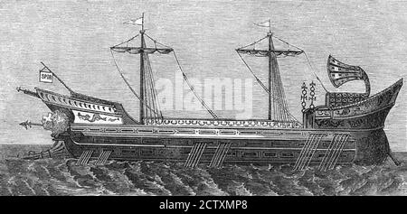 Trireme. Wood engraving of an ancient Roman Galley with three banks of oars, wood engraving, 1872 Stock Photo