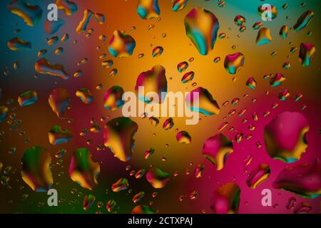 a lot of colorfull drops on window Stock Photo