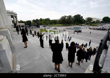 Washington. 25th Sep, 2020. Female members of Congress stand on the steps of the U.S. Capitol as they wait for family members and the flag-draped casket of Justice Ruth Bader Ginsburg to depart the U.S. Capitol, Friday, Sept. 25, 2020, in Washington.Credit: Alex Brandon/Pool via CNP | usage worldwide Credit: dpa/Alamy Live News Stock Photo