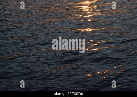 Sunset Light Reflected on Water Stock Photo