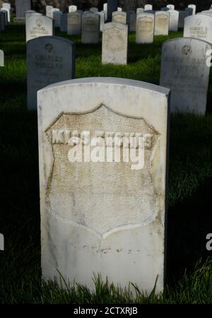 A 19th century marble tombstone inscribed simply with 