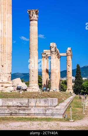 Zeus temple in Athens, Greece. It is famous landmark of Athens. Vertical view of Corinthian columns of old Olympian Zeus building, Ancient Greek ruins Stock Photo