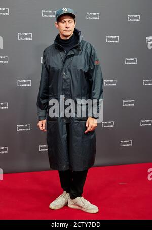 Hamburg, Germany. 25th Sep, 2020. Marc Hosemann, actor, comes to the premiere of his film 'Cortex' at the Filmfest Hamburg. Credit: Georg Wendt/dpa/Alamy Live News Stock Photo