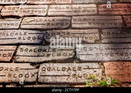 Coaldale Block street pavers line a walkway at Spring Hill College, Aug.  22, 2020, in Mobile, Alabama. The red clay bricks were made by Coaldale  Brick Stock Photo - Alamy