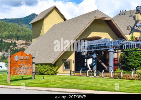 Gondolas enter the Silver Mt Ski Resort, site of an avalanche that killed 2 skiers in January 2020 and the longest single span gondola in the world Stock Photo