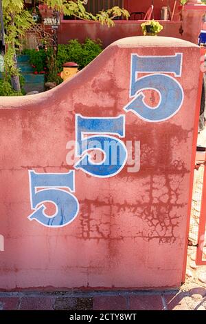 555 numbers paiinted on a wall outside a house in downtown Tucson, AZ Stock Photo