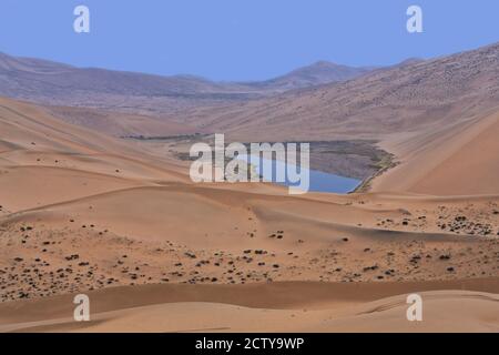 Unidentified lake among megadunes in the Badain Jaran Desert-Inner Mongolia-China-1052 Stock Photo