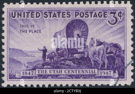 Utah Settlement stock photo.A Stamp printed in USA shows the Pioneers entering the Valley of Great Salt Lake, devoted to Utah Settlement Centenary,cir Stock Photo