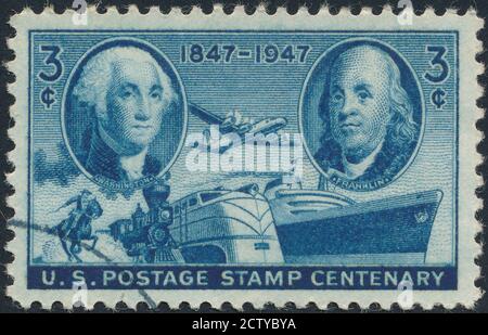 Washington And Franklin Stamp stock photo.Cancelled Stamp From The United States Featuring George Washington And Ben Franklin. Franklin Lived From 170 Stock Photo