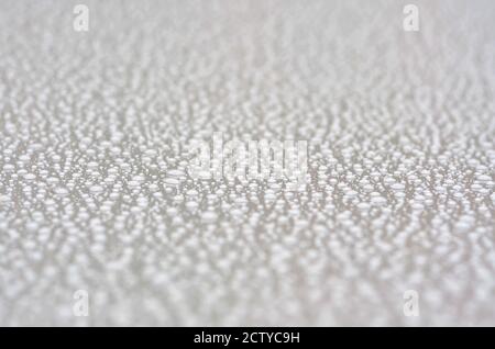 Raindrops on a flat surface Stock Photo