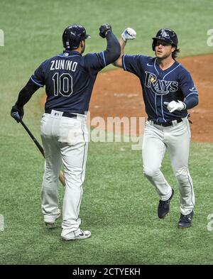 Tampa Bay Rays' Mike Zunino heads to first after being hit by a pitch  against the New York Yankees during the seventh inning of a baseball game  Sunday, May 29, 2022, in