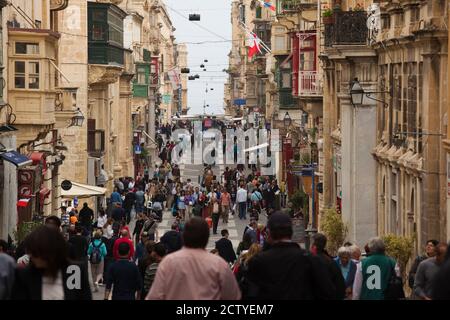 Pedestrians on the Triq ir-Repubblika, Valletta, Malta Stock Photo