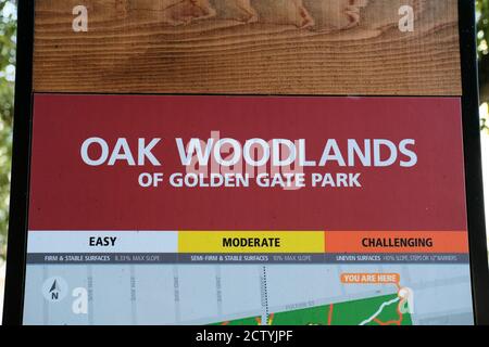 Oak Woodlands sign at the northeast corner of Golden Gate Park in San Francisco, California; map guide for easy, moderate, and challenging trails. Stock Photo