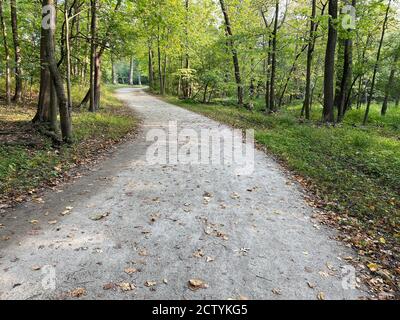 Walking path in the Cook County Forest Preserve on an early fall afternoon. Stock Photo