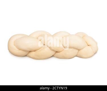 Handmade small braided bread bun ready to go in the oven. Pale yeast dough made with flour, butter, milk, yeast and salt. Traditional Swiss bread. Stock Photo