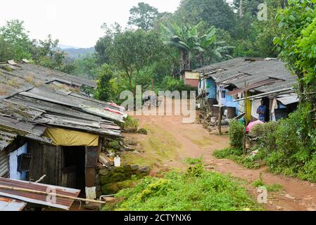 A rural house made of bricks and mud in India with many people living together. India Kerala Tamil Nadu  street life photography. Stock Photo