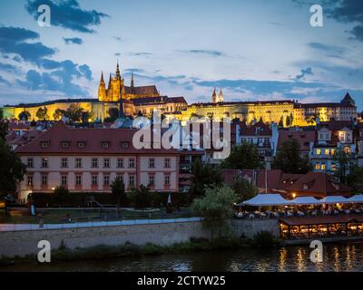 PRAGUE, CZECH REPUBLIC:   View of Prague Castrle and St Vitus Cathedral lit-up at night seen across the Vltava River