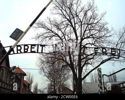 Auschwitz, Lesser Poland, Poland - January 24 2009. Arbeit macht frei - work sets you free. The description on the main gate of Auschwitz Birkenau ger Stock Photo
