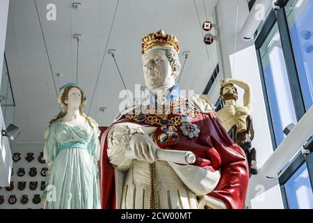 Replica figureheads fly high in the entrance of Plymouth’s new museum, with more, The Box. The former central library and art gallery has been enlarge Stock Photo