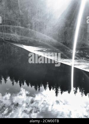 River water cascading over a weir on a river in scotland, UK Stock Photo