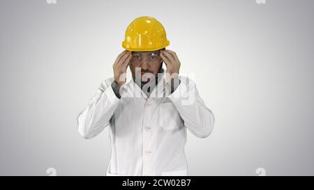Transparent safety glasses in hand Worker trying on protective g Stock Photo