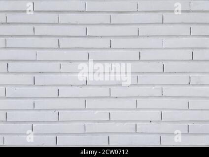 Seamless texture with a white bricks wall. Stock Photo