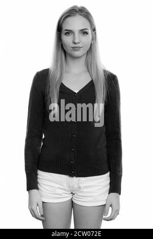 Studio shot of young beautiful teenage girl standing Stock Photo