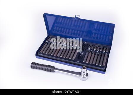 Ratchet with hexagonal and torx bits on a white Stock Photo