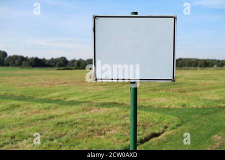 Old metal sign with lots of empty space for own text. Stock Photo