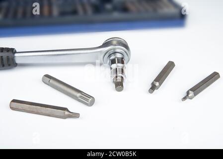 Ratchet with torx bits on a white background Stock Photo