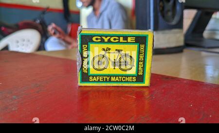 Vintage cardboard matchbox with matches isolated on white