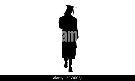 Silhouette Happy graduating student walking and making a call. Stock Photo