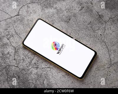 Assam, india - September 24, 2020 : Wipro logo on phone screen stock image. Stock Photo