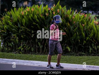 Manila, Philippines. 26th Sep, 2020. A woman jogs in Manila, the Philippines, Sept. 26, 2020. The number of confirmed COVID-19 cases in the Philippines surged to 301,256 with 2,747 new coronavirus infections reported by the health ministry on Saturday. Credit: Rouelle Umali/Xinhua/Alamy Live News Stock Photo